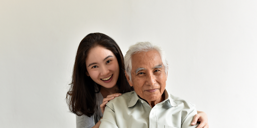 adult daughter with senior father