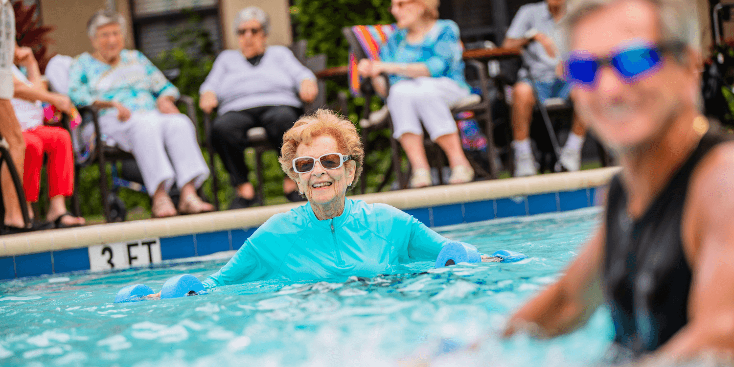woman in pool at senior living community