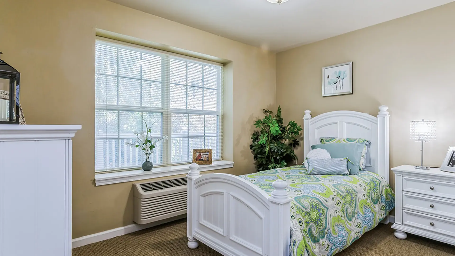 Bedroom of a senior apartment at Cedar Creek of Fort Wayne, designed for comfort and personalization