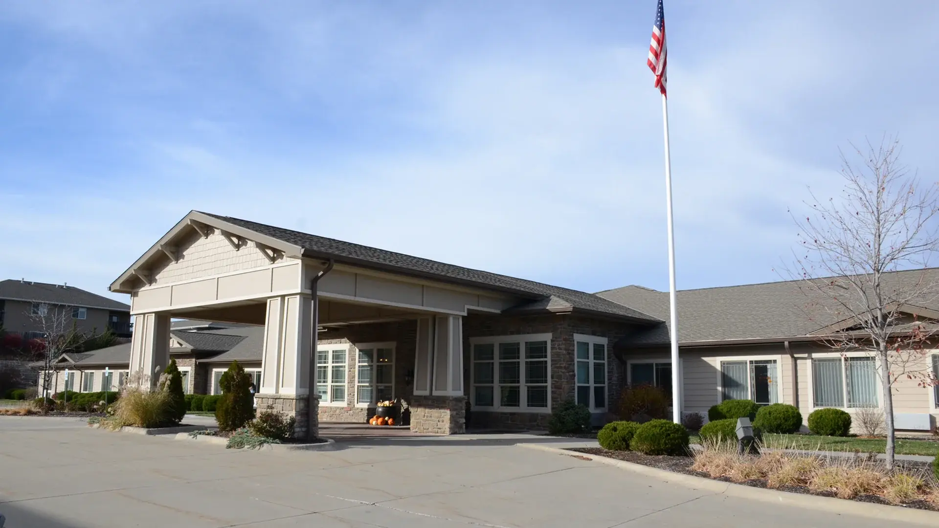 The welcoming front exterior of Cedar Creek of High Plains senior living community