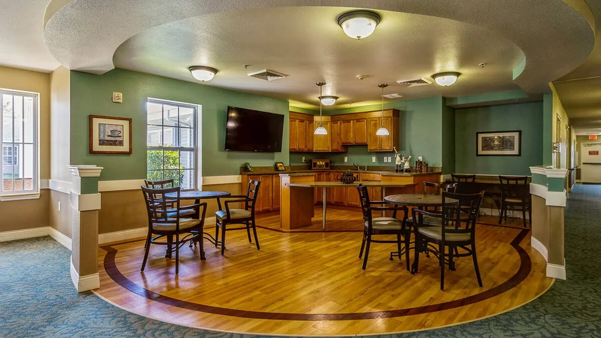 A spacious and bright dining room at Cedar Creek of Logansport, offering comfortable seating for meals