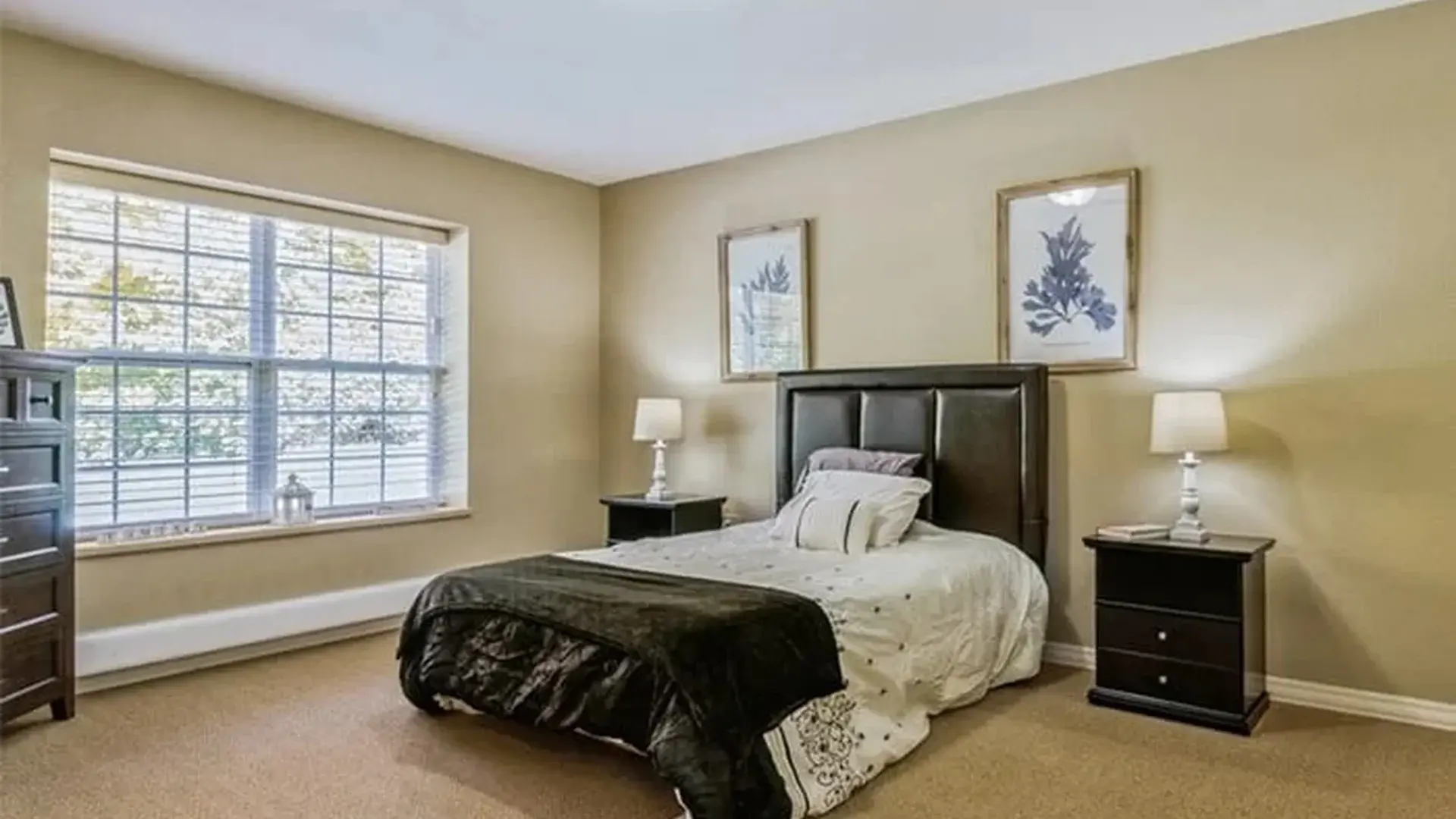 Bedroom of a senior apartment at Cedar Creek of Marion, designed for comfort and personalization