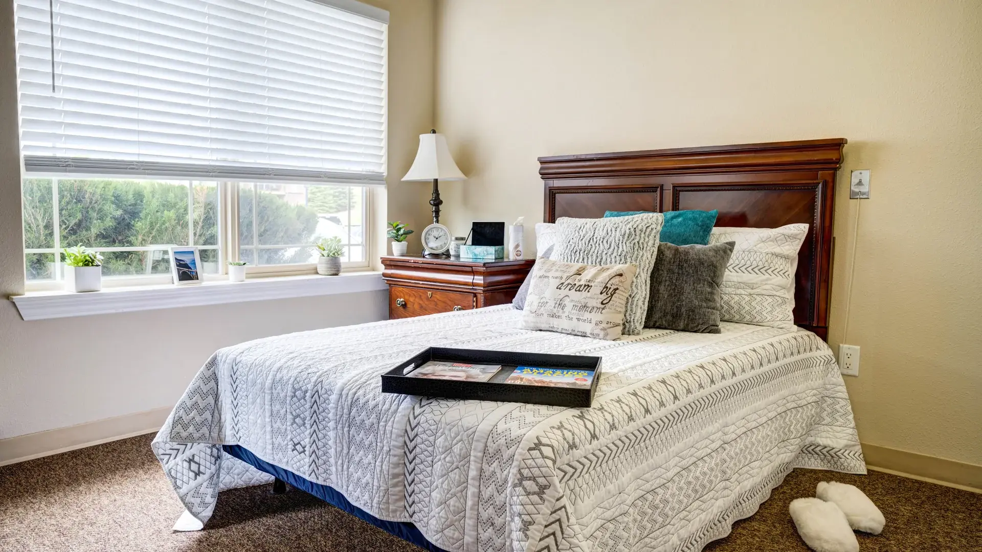 Bedroom of a senior apartment at Cedar Creek of Prairie Meadows, designed for comfort and personalization