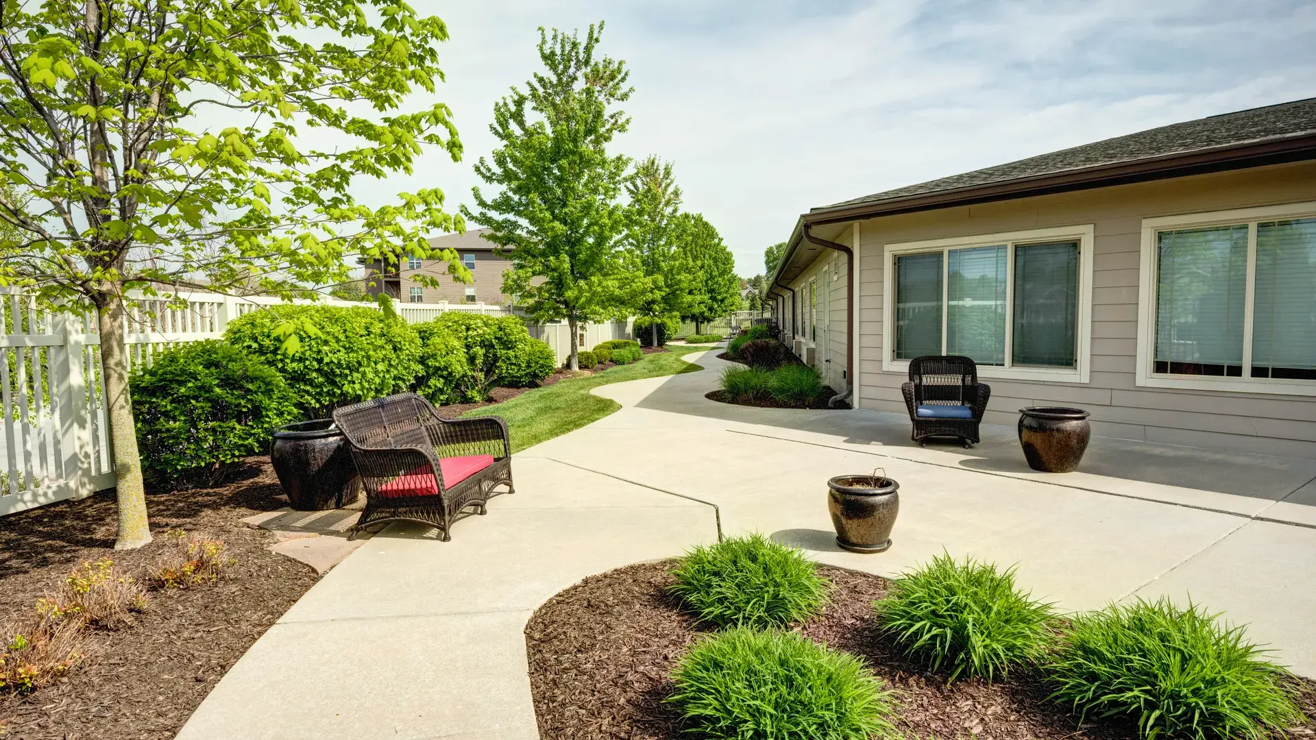 An aerial perspective showcasing the Cedar Creek of Prairie Meadows community, highlighting the inviting courtyards