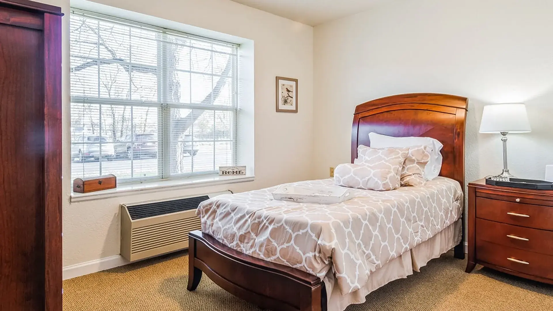 Bedroom of a senior apartment at Cedar Creek of Warsaw, designed for comfort and personalization