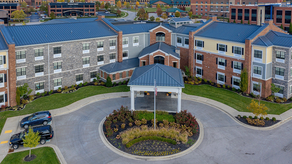 The inviting front exterior of the Cedarhurst of Beaumont senior living community building
