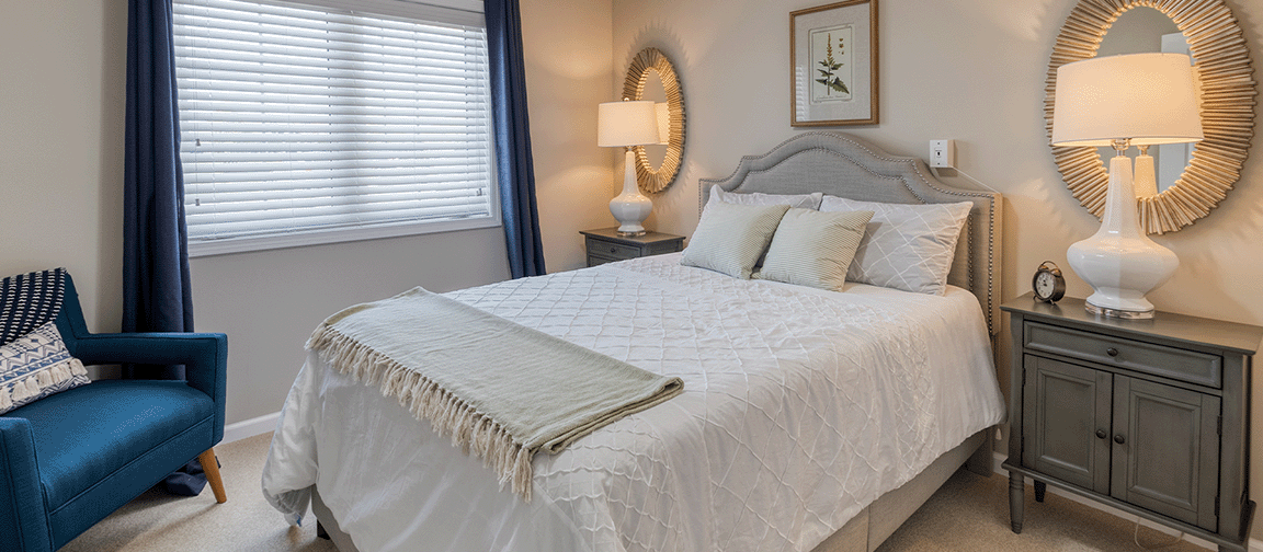 Bedroom of a senior apartment at Cedarhurst of Bethalto, designed for comfort and personalization.