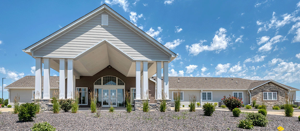 The welcoming front exterior of the Cedarhurst of Bethalto senior living community.