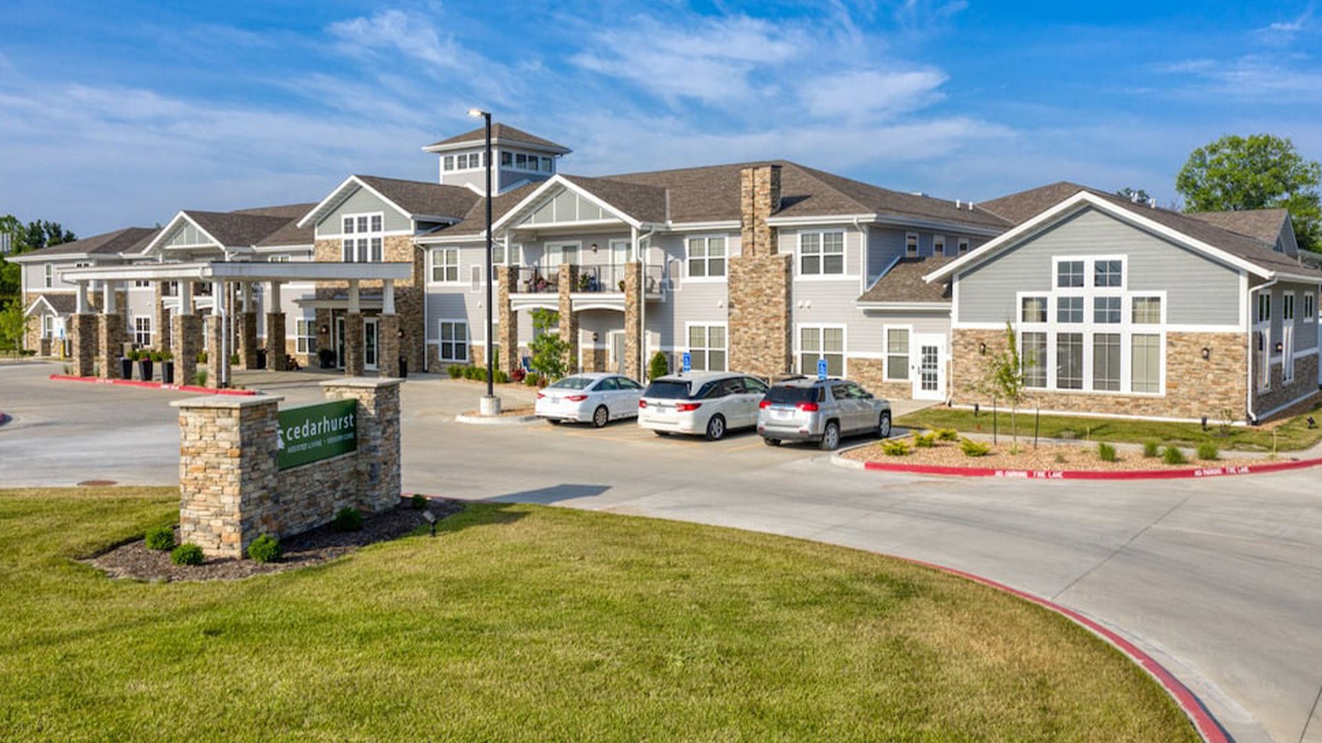 The welcoming front exterior of Cedarhurst of Blue Springs senior living community