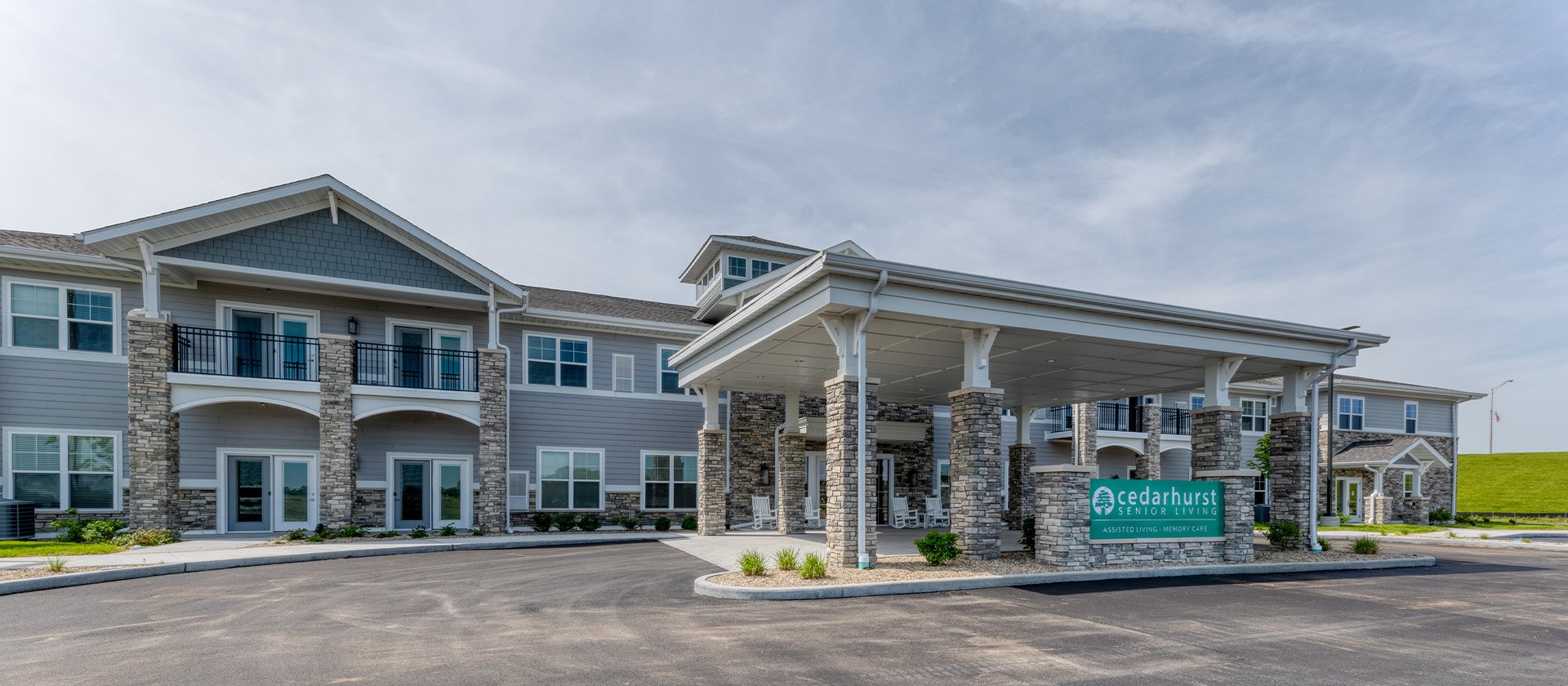 The welcoming front exterior of the Cedarhurst of Dyer senior living community