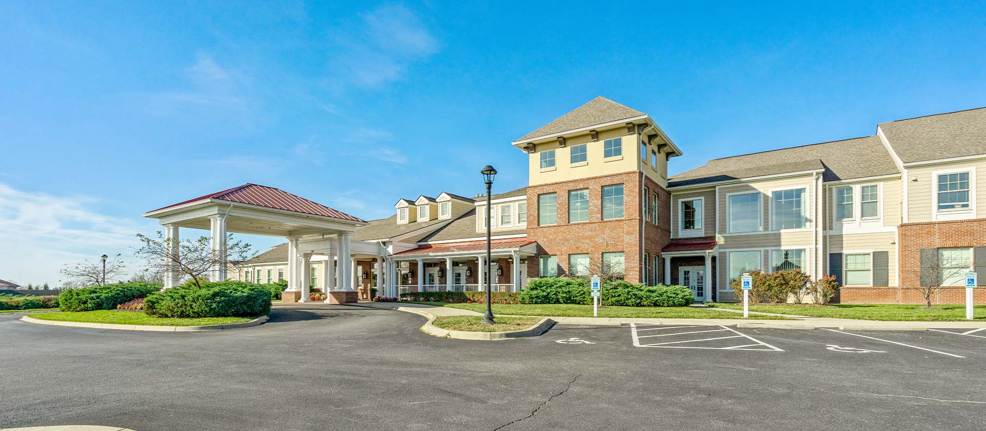 An inviting view of the Cedarhurst of East Louisville senior living community from the outside