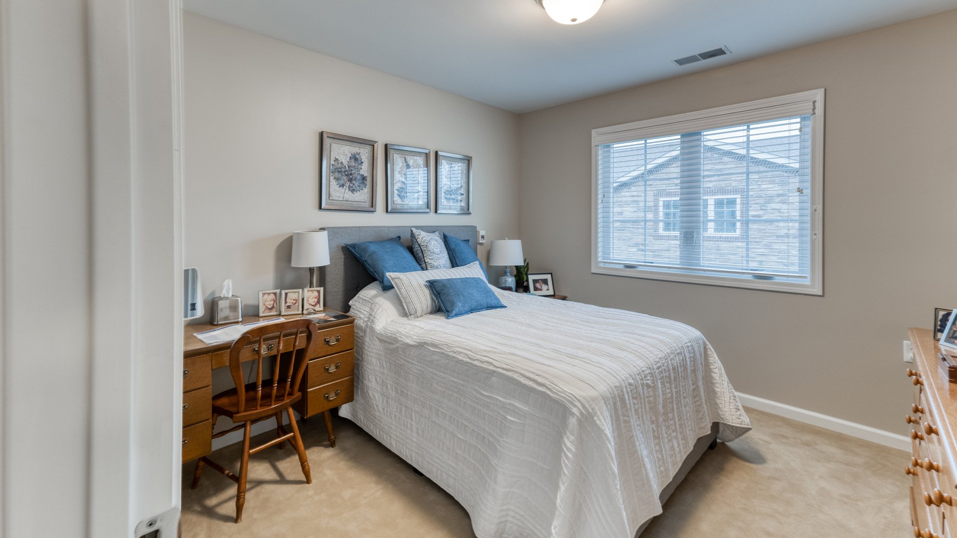 Bedroom of a senior apartment at Cedarhurst of Jacksonville, designed for resident comfort and personalization