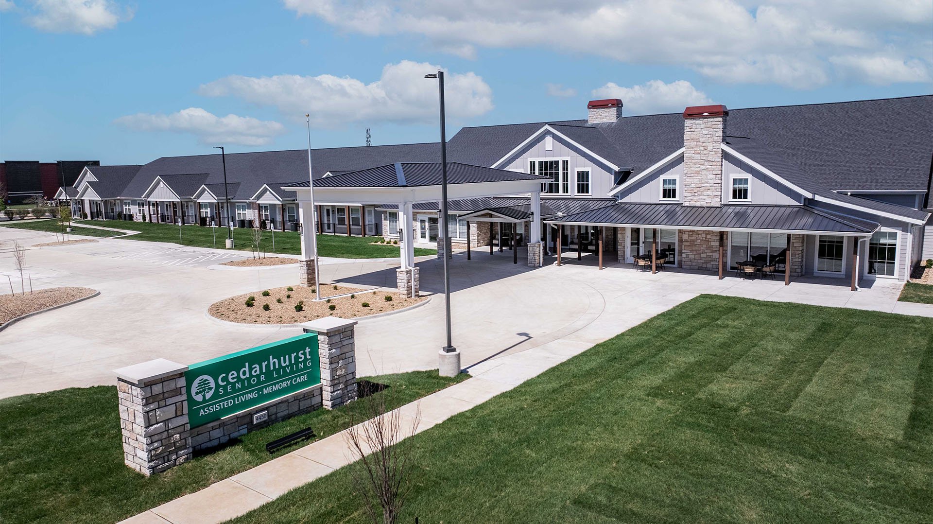 The welcoming front exterior of Cedarhurst of Lawrence senior living community