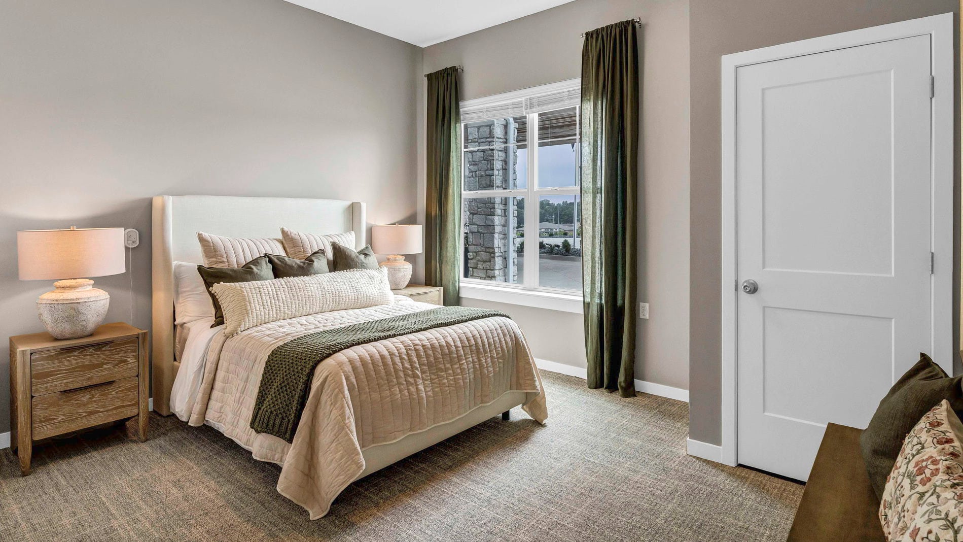 Bedroom of a senior apartment at Cedarhurst of Lincoln, designed for resident comfort and personalization