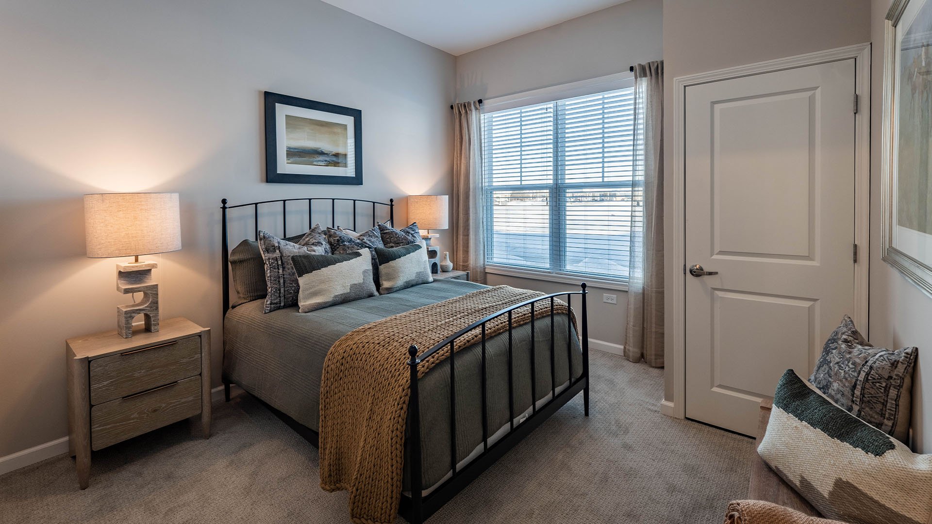 Bedroom of a senior apartment at Cedarhurst of McHenry, designed for resident comfort and personalization.
