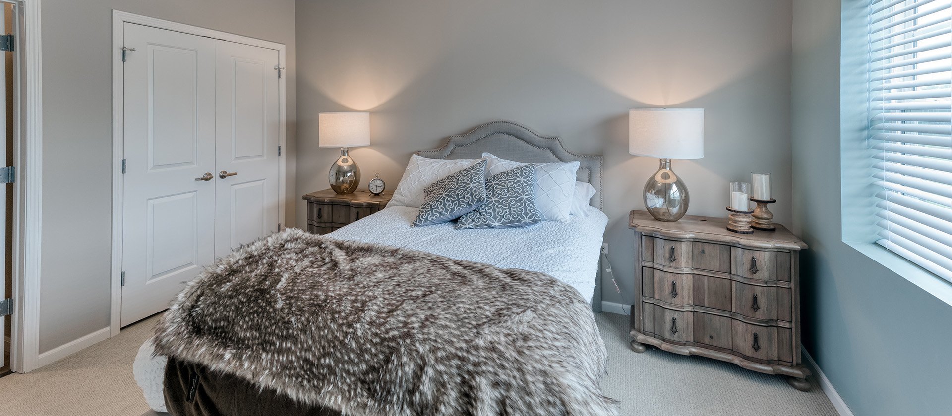 Bedroom of a senior apartment at Cedarhurst of Naperville, designed for resident comfort and personalization.