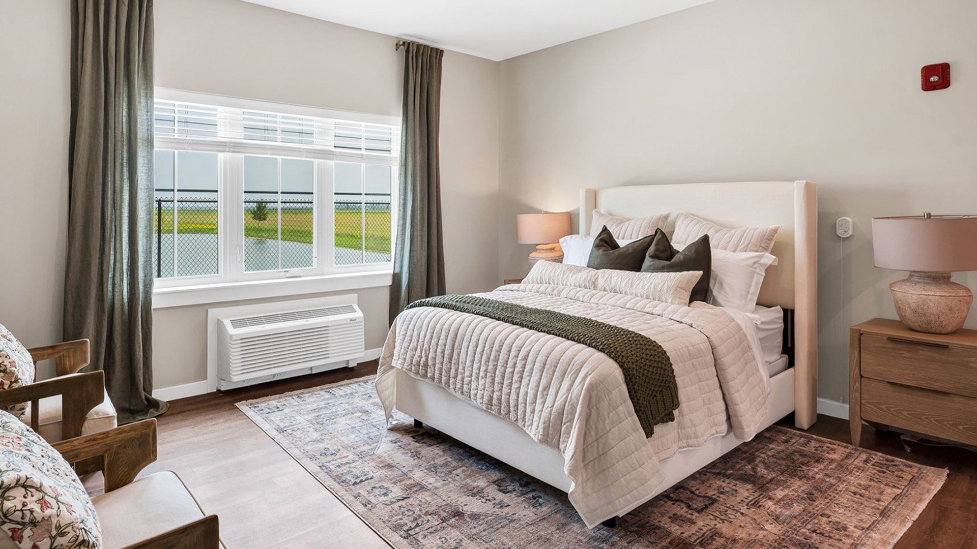 Bedroom of a senior apartment at Cedarhurst of Newburgh, designed for resident comfort and personalization.