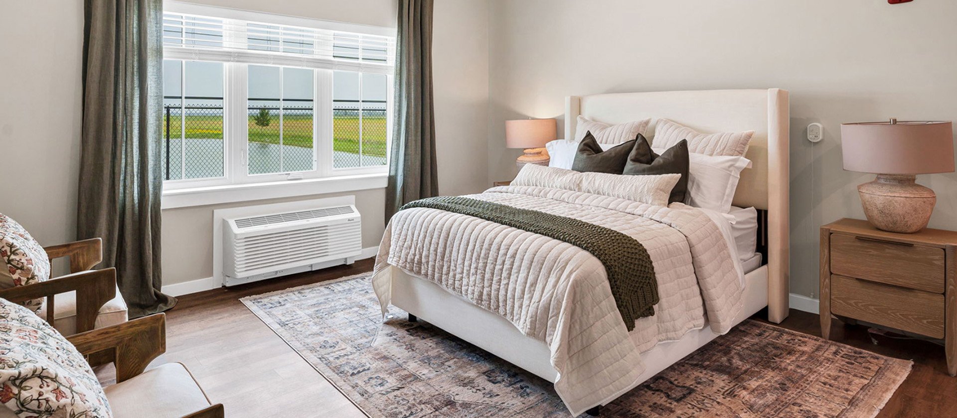 Bedroom of a senior apartment at Cedarhurst of Newburgh, designed for resident comfort and personalization.