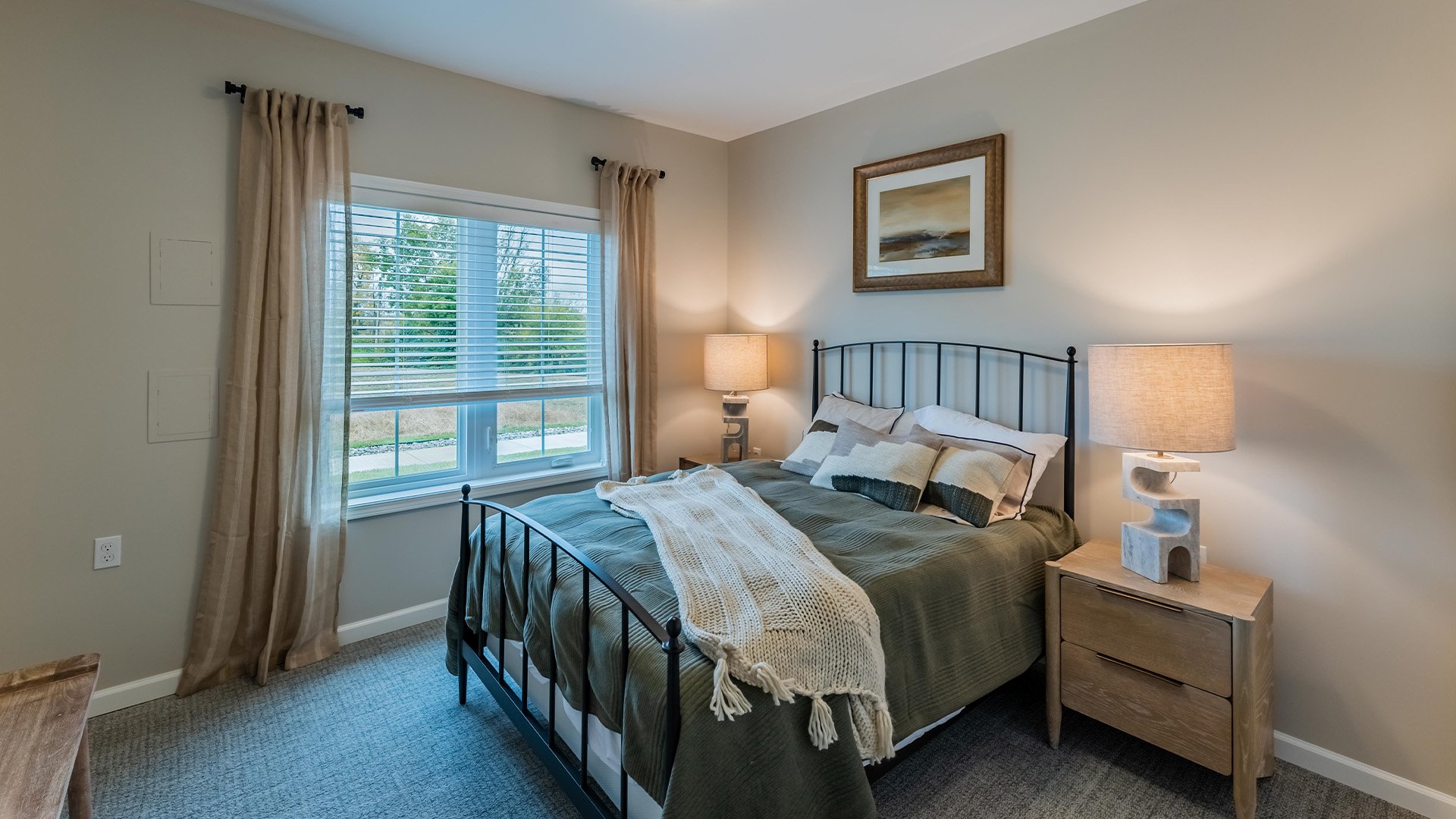Bedroom of a senior apartment at Cedarhurst of Nicholasville, designed for resident comfort and personalization.