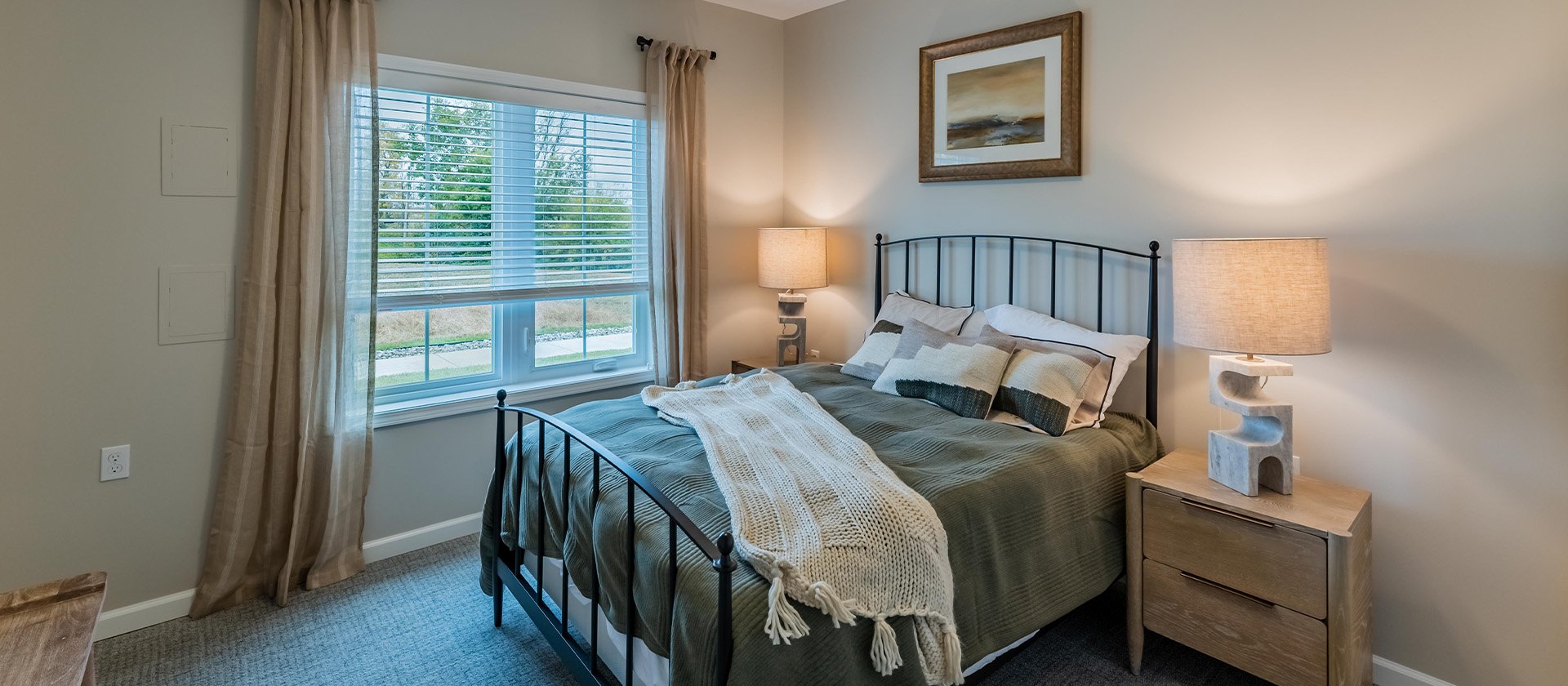 Bedroom of a senior apartment at Cedarhurst of Nicholasville, designed for resident comfort and personalization.