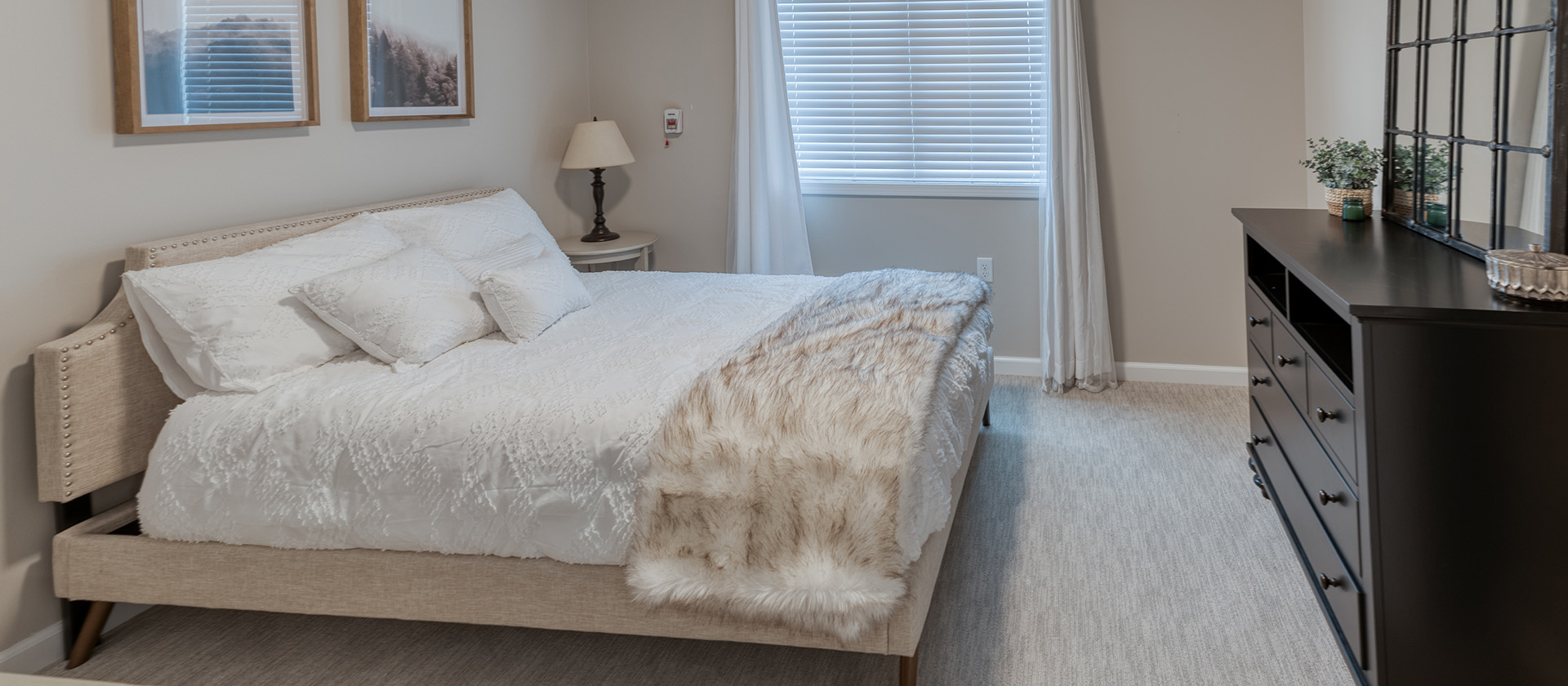 Bedroom of a senior apartment at Cedarhurst of Springfield, IL, designed for resident comfort and personalization
