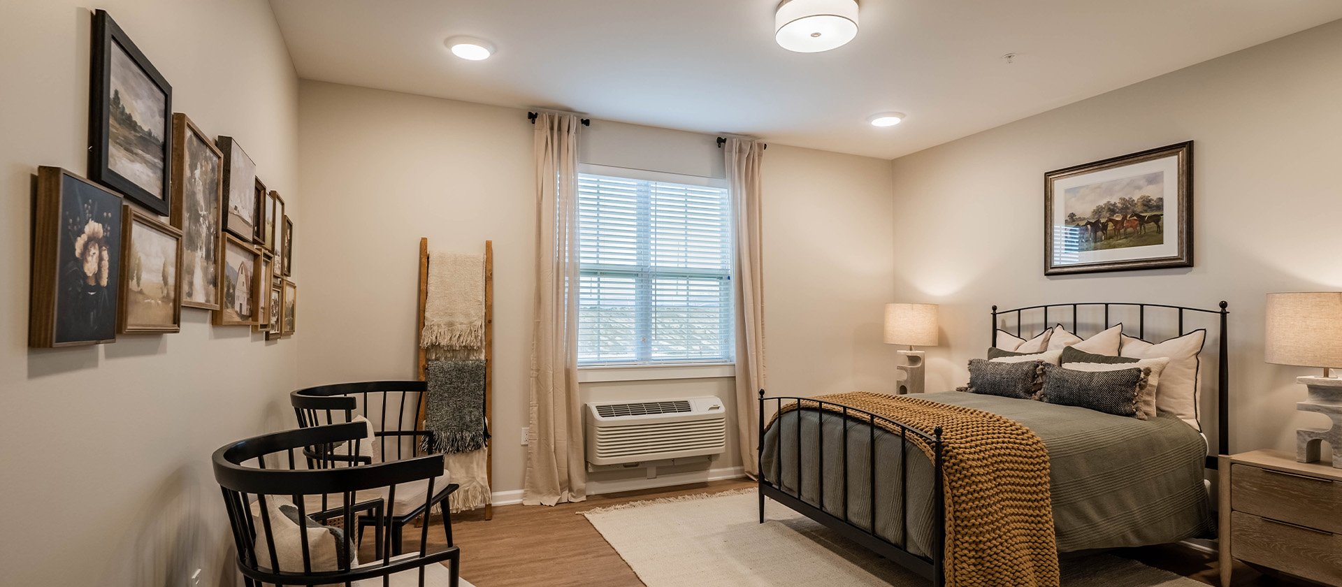 Bedroom of a senior apartment at Cedarhurst of Topeka, designed for resident comfort and personalization