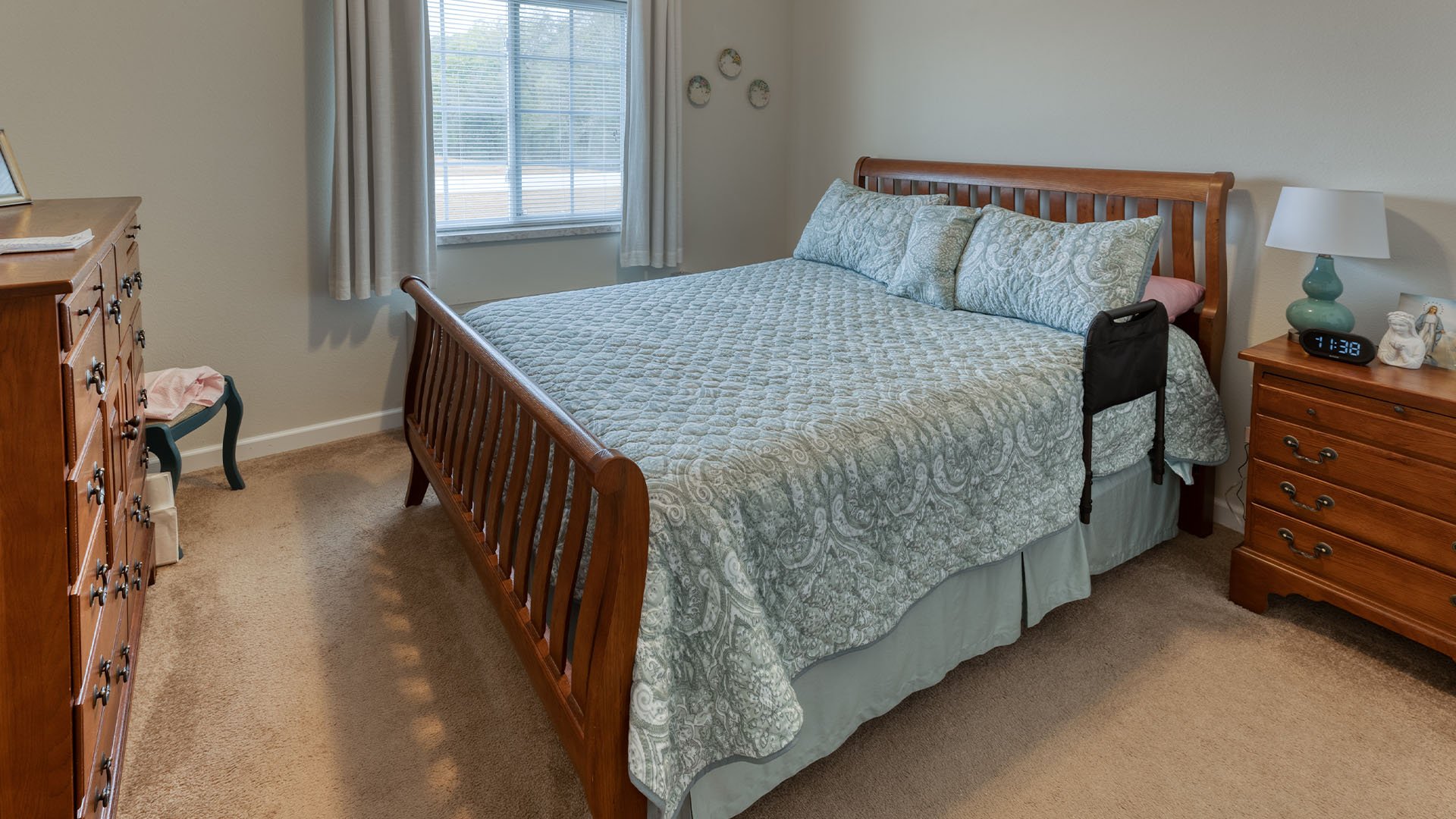 Bedroom of a senior apartment at Cedarhurst of Waterloo, designed for resident comfort and personalization