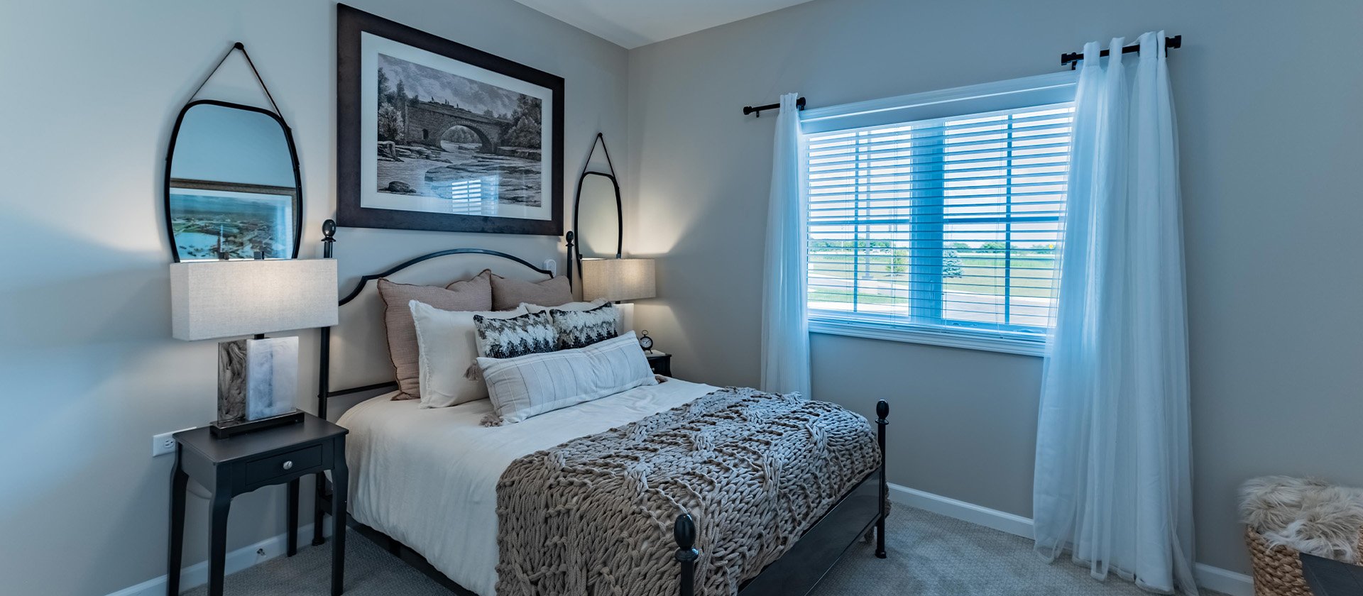 Bedroom of a senior apartment at Cedarhurst of Woodstock, designed for resident comfort and personalization