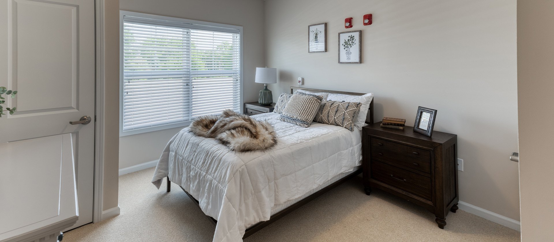 Bedroom of a senior apartment at Cedarhurst of Yorkville, designed for resident comfort and personalization