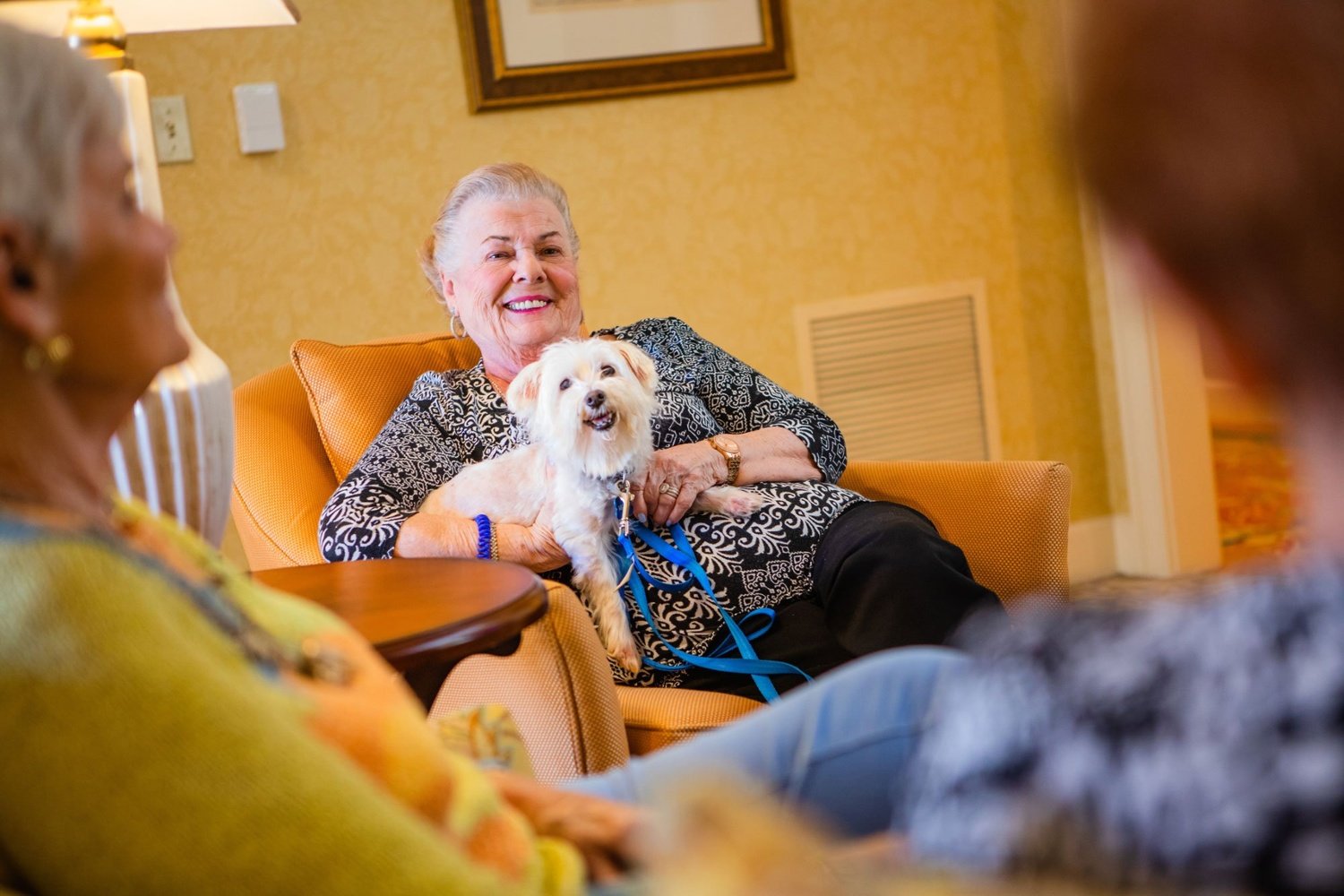 Smiling senior woman with dog