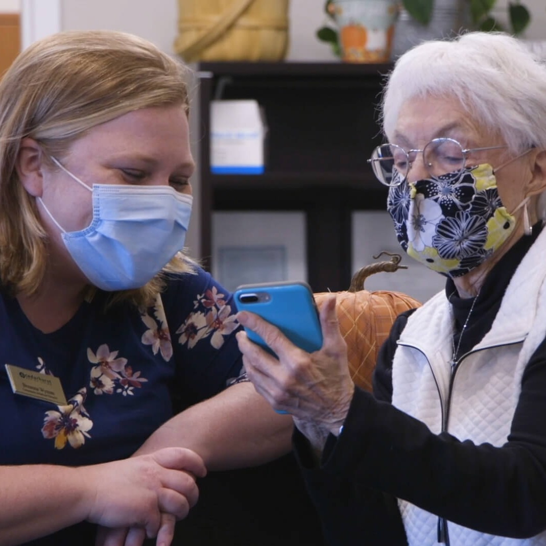 Shirley showing staff member phone