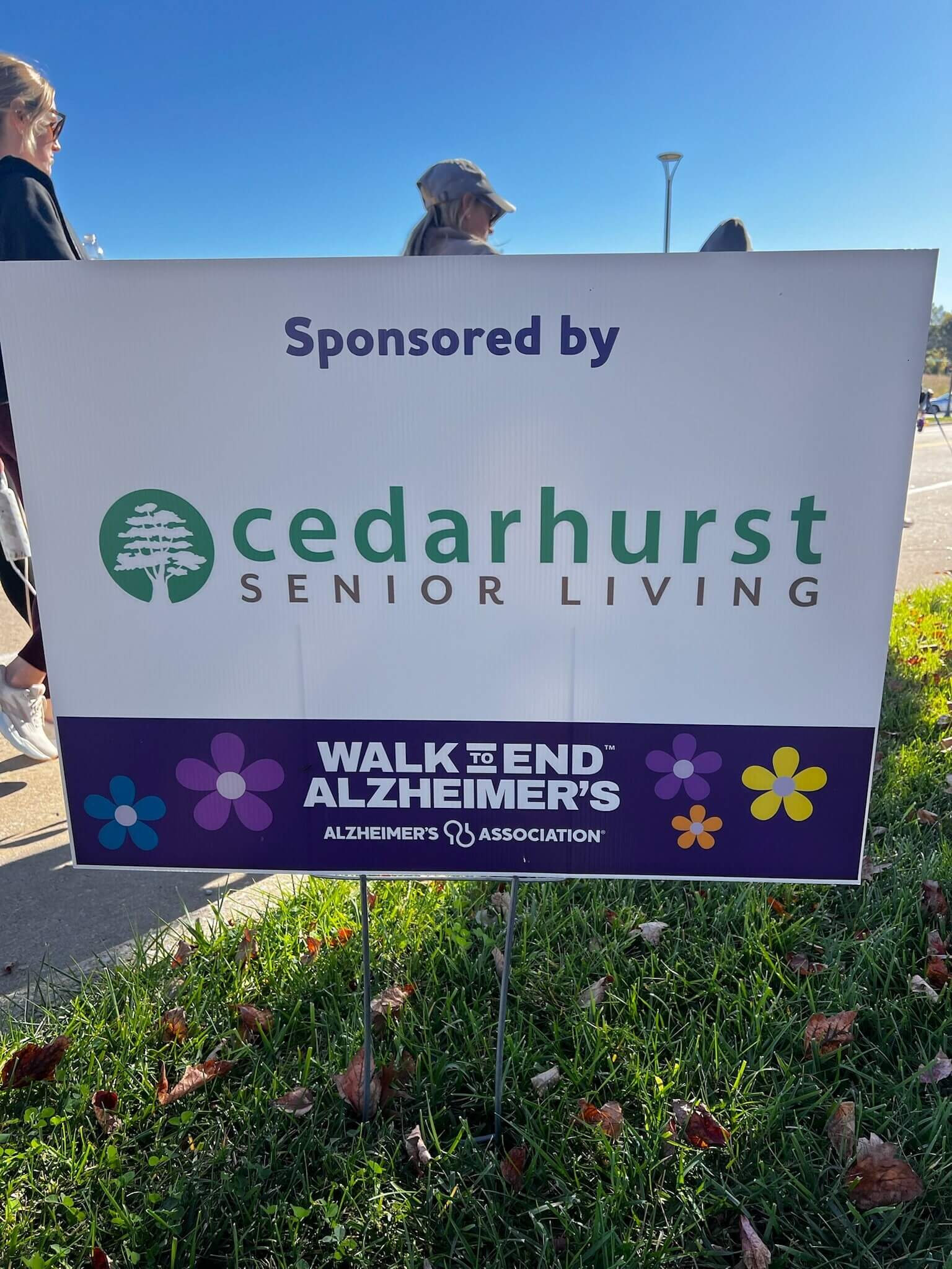 Walk to End Alzheimer's sponsored by Cedarhurst Senior Living sign.