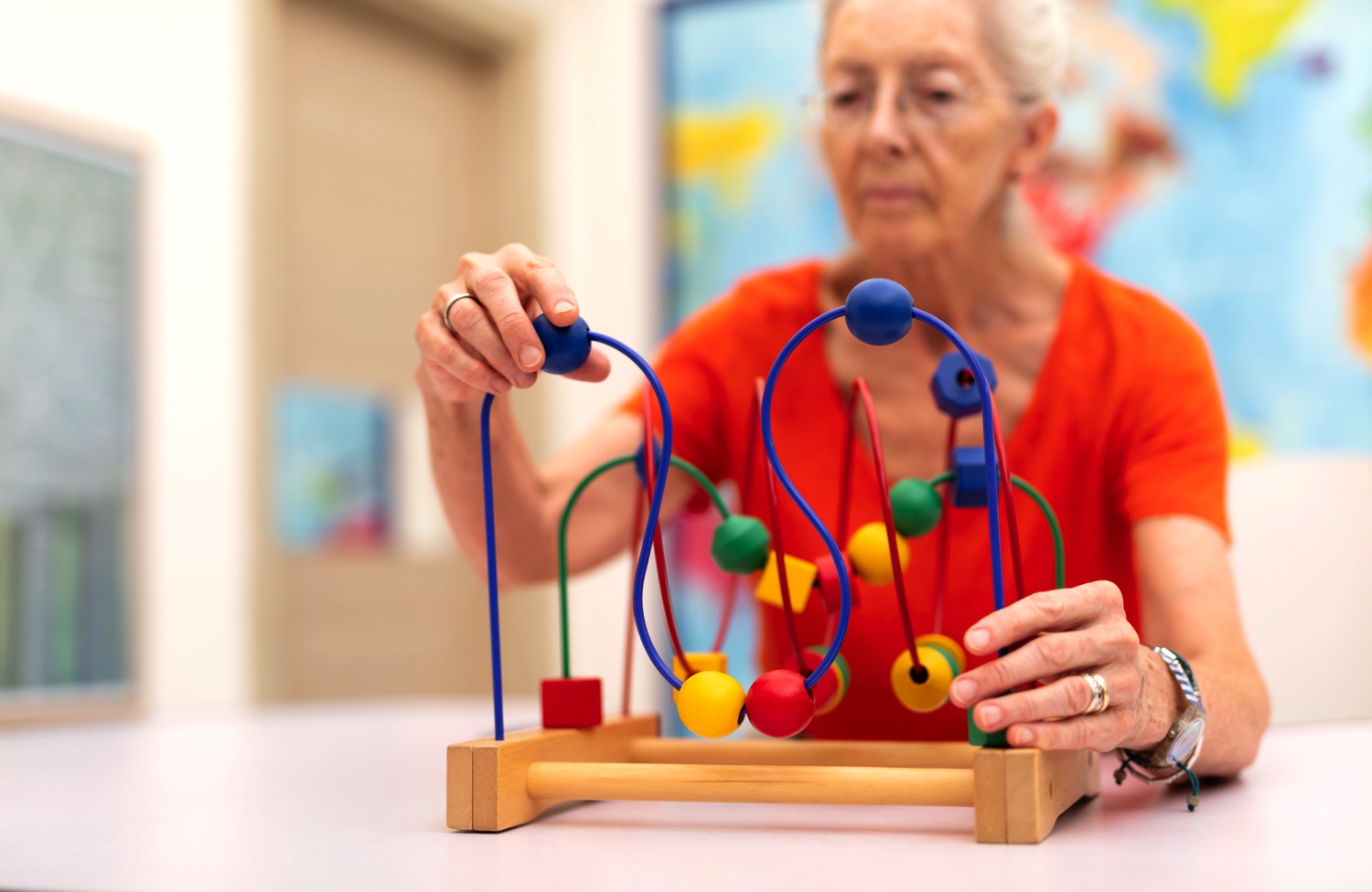 Senior using sensory toy