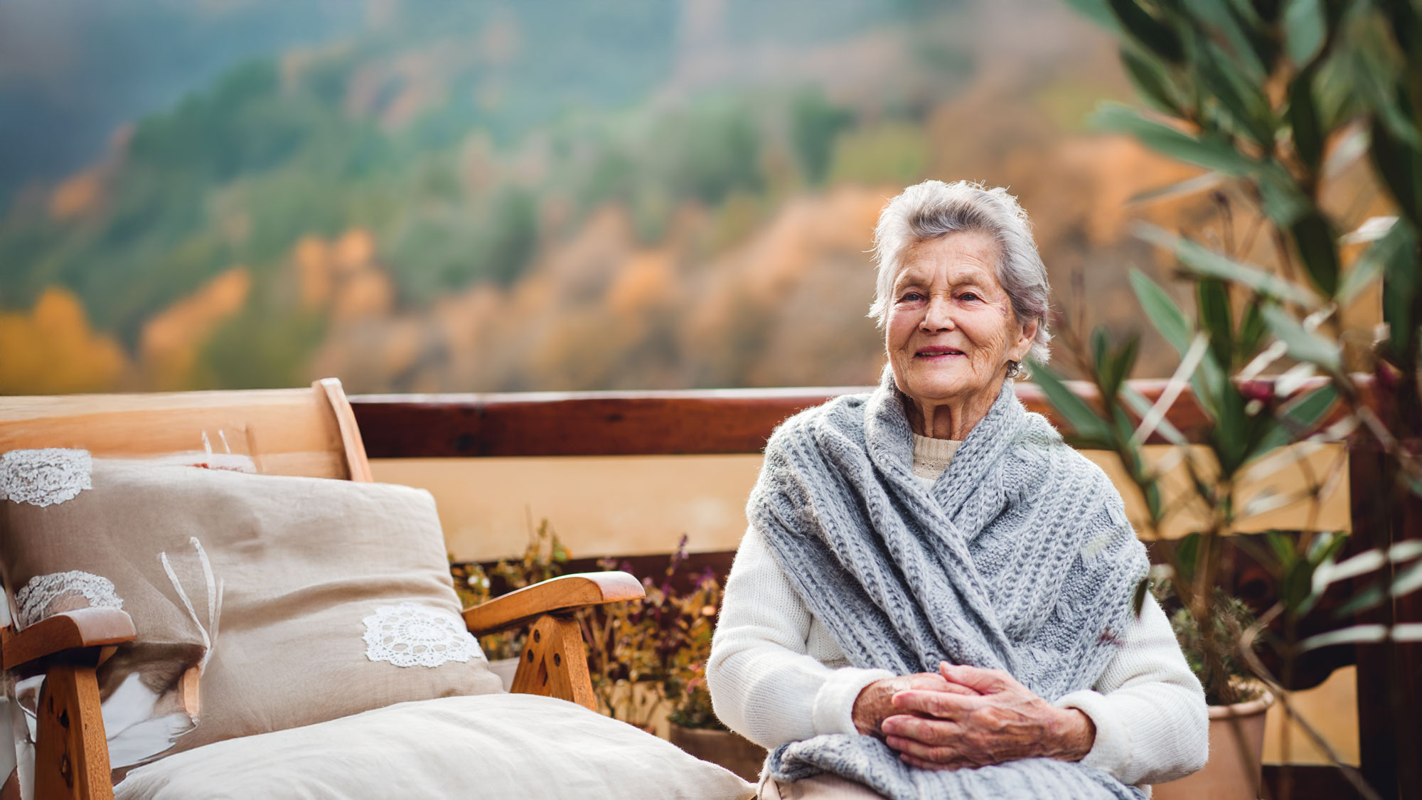 senior woman sitting outside